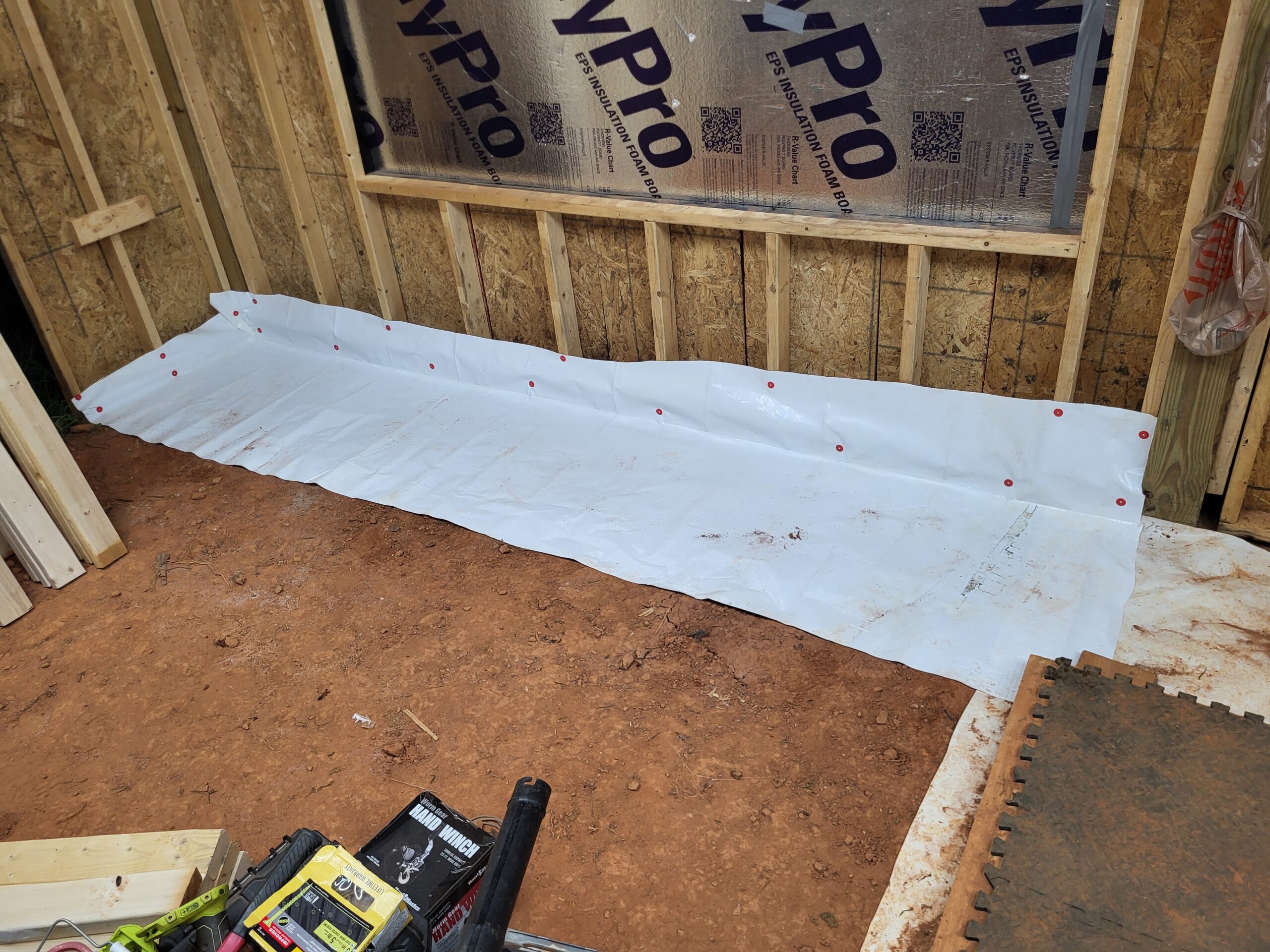 Carport storage area before custom organization build