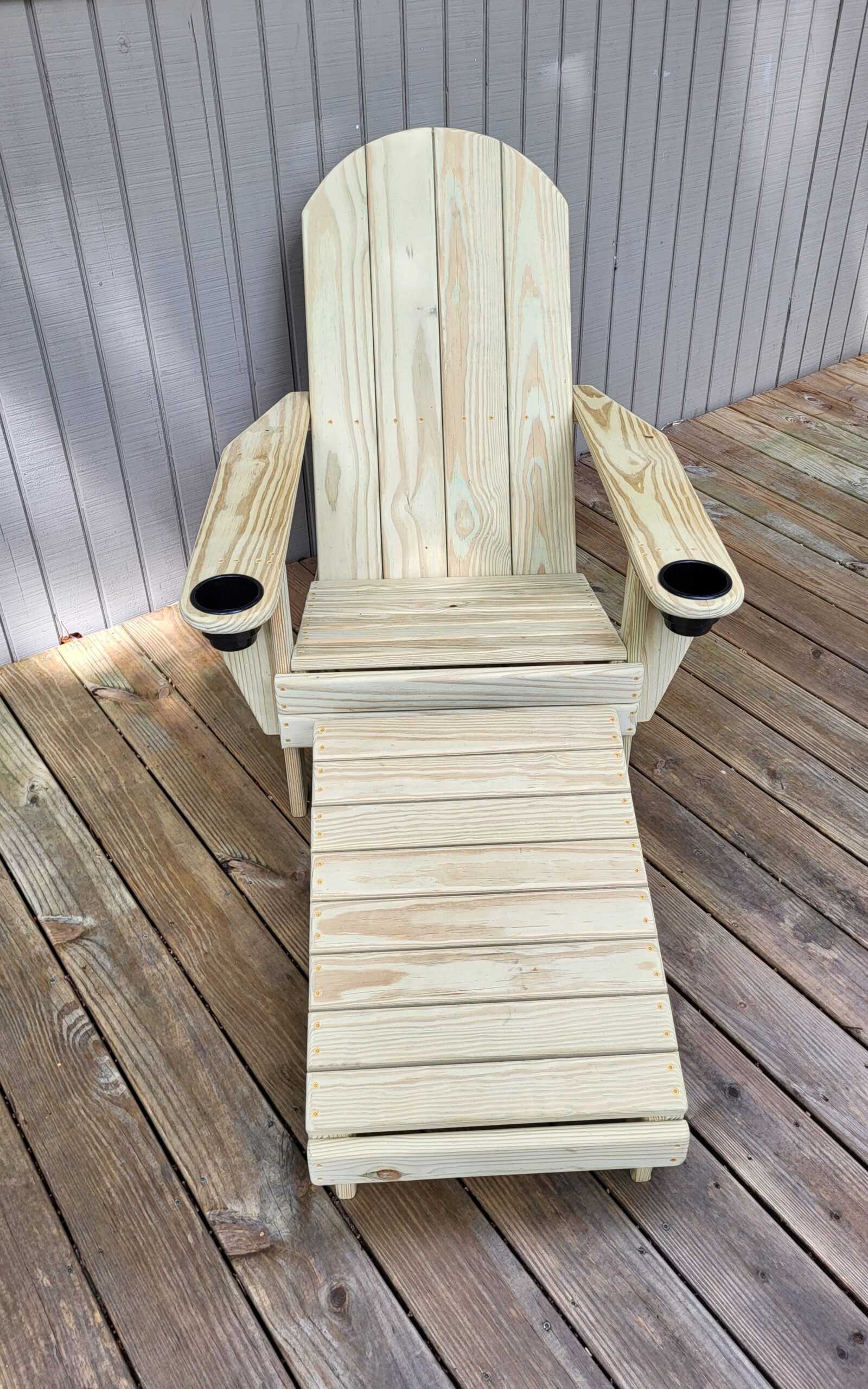 A wooden outdoor chair made by Logan