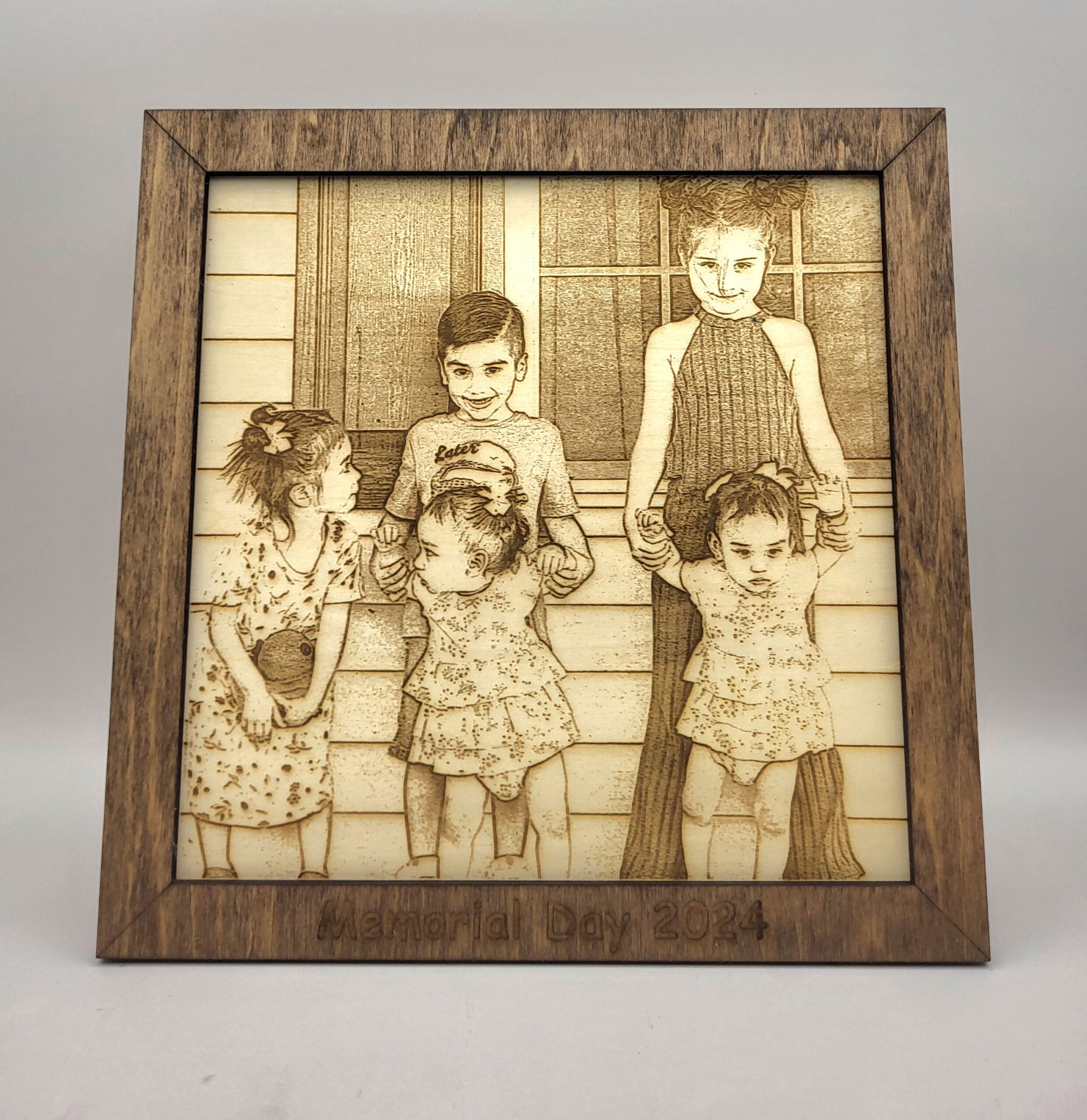 A laser engraved portrait made by Logan