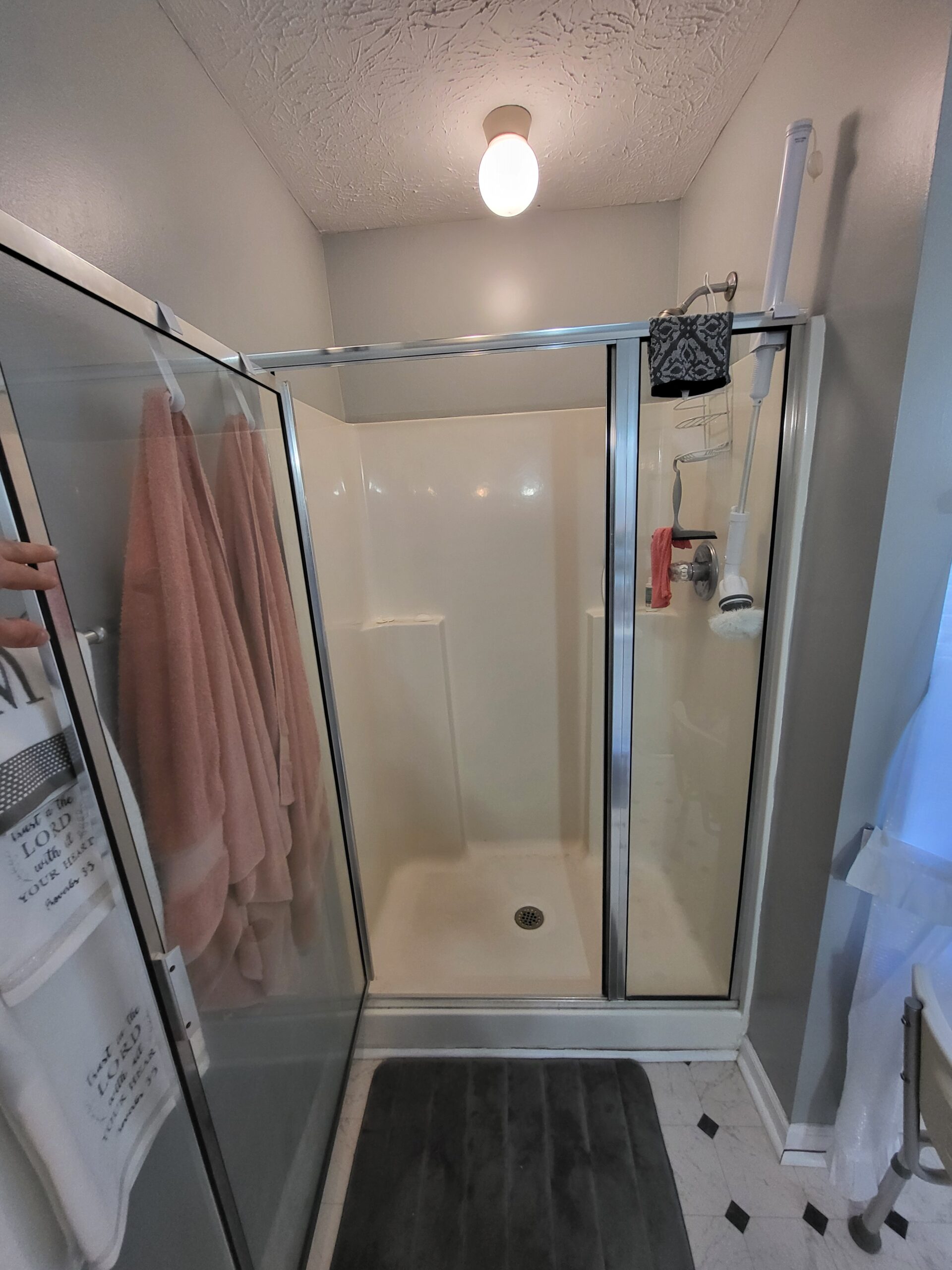Bathroom before VA HISA accessible shower remodel