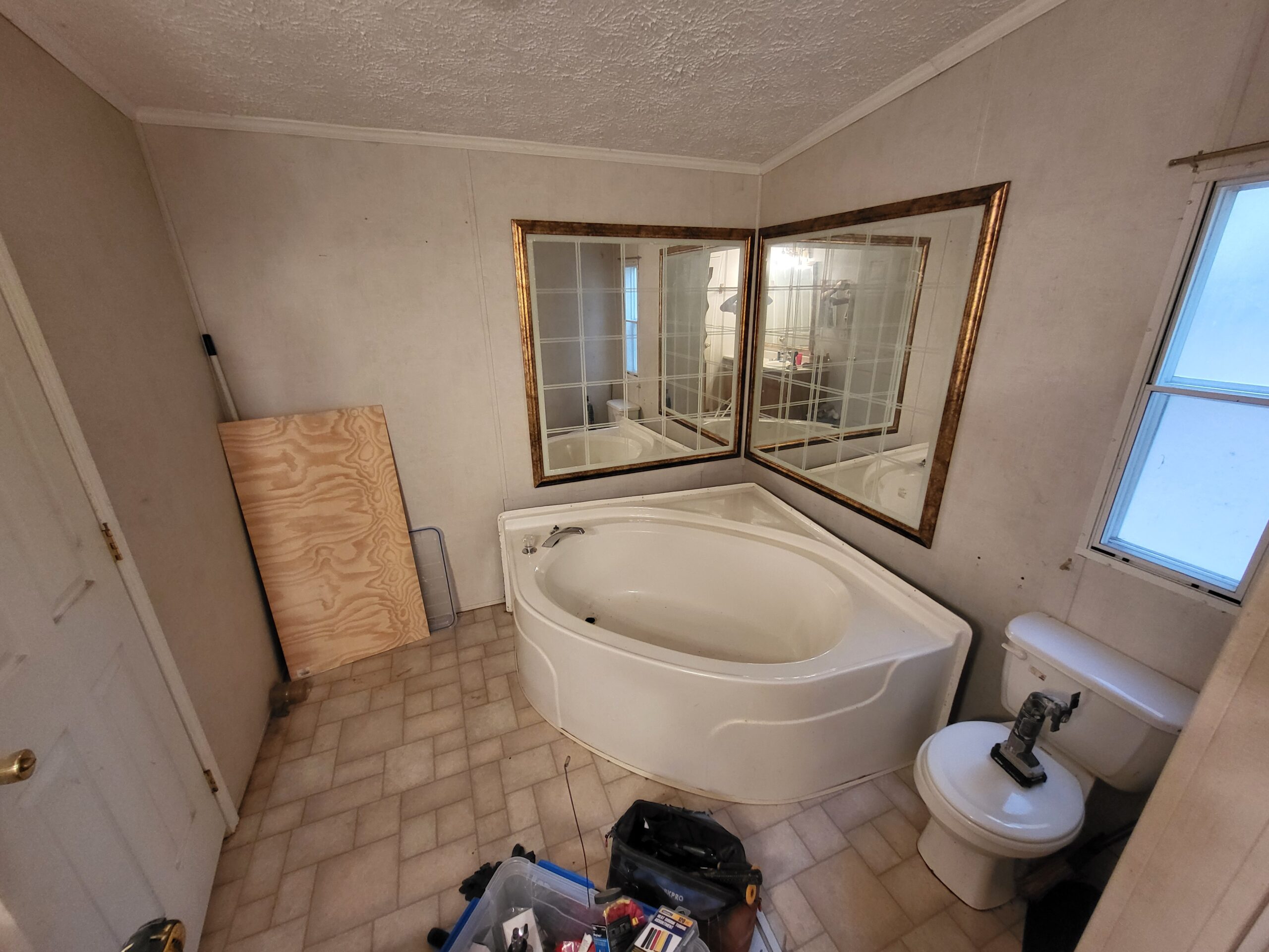 Bathroom before VA HISA accessible shower remodel